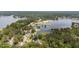An aerial view of waterfront properties with private docks and scenic lake access at 15 Clearwater Harbour Hbr, Sanford, NC 27332