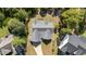 Birds eye view of the house featuring a grey roof and an extended driveway at 15 Clearwater Harbour Hbr, Sanford, NC 27332