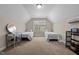 Bedroom featuring two beds, a vanity, and a window offering a view to the outdoors at 15 Clearwater Harbour Hbr, Sanford, NC 27332