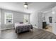 Bright bedroom featuring two windows and ensuite bathroom at 15 Clearwater Harbour Hbr, Sanford, NC 27332