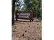 A real estate sign for the community at 15 Clearwater Harbour Hbr, Sanford, NC 27332