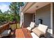 Charming deck with outdoor seating and wooded views for relaxing and entertaining at 15 Clearwater Harbour Hbr, Sanford, NC 27332