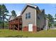 Exterior view showing the deck, siding and access to the backyard at 15 Clearwater Harbour Hbr, Sanford, NC 27332