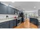 Charming kitchen featuring granite countertops, stainless steel appliances, and ample cabinet space at 15 Clearwater Harbour Hbr, Sanford, NC 27332