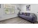 Comfortable living room with a plush sofa and view of the neighborhood at 15 Clearwater Harbour Hbr, Sanford, NC 27332