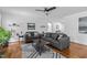 Bright living room featuring a ceiling fan and lots of natural light at 15 Clearwater Harbour Hbr, Sanford, NC 27332