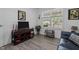 Cozy living area featuring a sleek TV console and a bright window view to the outdoors at 15 Clearwater Harbour Hbr, Sanford, NC 27332
