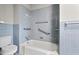 Bathroom with a combined shower and tub with tiled walls at 1502 Washington St, Durham, NC 27701
