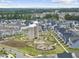 A scenic aerial view of the Silos neighborhood featuring parks and tree-lined streets at 1605 Silo Point Dr, Wake Forest, NC 27587