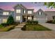 Charming two-story home with a well-manicured lawn and welcoming front porch at 1605 Silo Point Dr, Wake Forest, NC 27587