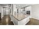 Kitchen with a large island and stainless steel appliances at 1605 Silo Point Dr, Wake Forest, NC 27587