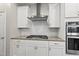 Modern kitchen featuring stainless steel appliances and white cabinets at 1605 Silo Point Dr, Wake Forest, NC 27587