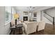 Cozy living room featuring a fireplace and staircase at 1605 Silo Point Dr, Wake Forest, NC 27587