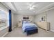 Bright main bedroom with tray ceiling, carpet, and lots of natural light at 1605 Silo Point Dr, Wake Forest, NC 27587