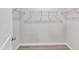 Empty closet showing wire rack shelves and hardwood floors at 1665 Wilde Bnd, Apex, NC 27523