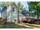 Expansive backyard deck with multi-level features and a lush, green lawn at 1700 Laura Duncan Rd, Apex, NC 27502