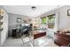 Bright room featuring neutral carpet, natural light, desk space, and closet at 1700 Laura Duncan Rd, Apex, NC 27502