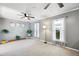 Bright living area with neutral paint, plush carpeting, and filled with lots of natural light at 1700 Laura Duncan Rd, Apex, NC 27502