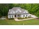 Beautiful home on a landscaped lot with mature trees, nice yard and circular driveway at 197 Boxwood Dr, Pittsboro, NC 27312