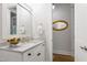 Bright bathroom vanity featuring quartz countertops and a decorative bowl at 197 Boxwood Dr, Pittsboro, NC 27312