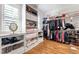 Spacious walk-in closet with custom shelving and ample storage space at 197 Boxwood Dr, Pittsboro, NC 27312