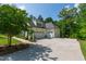 Spacious three car garage with expansive concrete driveway at 197 Boxwood Dr, Pittsboro, NC 27312