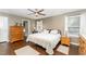 A relaxing main bedroom with a neutral color scheme, fan, and natural light from a window at 198 Fore View Ln, Sanford, NC 27332