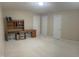 Bedroom featuring neutral walls, carpet, and a desk with shelving, perfect for a home office or study space at 210 Shillings Chase Dr, Cary, NC 27518