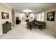 This living room boasts built-in shelves and cabinetry surrounding a cozy fireplace, perfect for relaxation at 210 Shillings Chase Dr, Cary, NC 27518