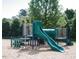 Community playground features a slide and other fun climbing structures at 2205 Karns Pl, Raleigh, NC 27614