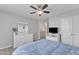 Comfortable bedroom with plenty of natural light, neutral tones, and ample closet space at 2305 Everstone Rd, Wake Forest, NC 27587