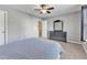 Bright bedroom featuring neutral walls, carpet flooring and a dark dresser at 2305 Everstone Rd, Wake Forest, NC 27587