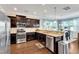 Well-appointed kitchen with stainless appliances, granite counters, and convenient access to the adjacent dining area at 2305 Everstone Rd, Wake Forest, NC 27587