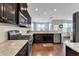 Spacious kitchen with stainless steel appliances, granite countertops, and an open floor plan at 2305 Everstone Rd, Wake Forest, NC 27587