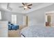 The main bedroom features a tray ceiling and comfortable seating area for relaxation at 2305 Everstone Rd, Wake Forest, NC 27587