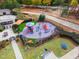 Aerial view of a community playground with colorful play structures and picnic tables for Gathering fun at 2305 Everstone Rd, Wake Forest, NC 27587