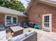 Outdoor deck with comfortable seating and a grill, perfect for entertaining guests or relaxing at 235 Stephenson Rd, Benson, NC 27504
