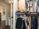 Walk-in closet with ample storage space, organized shelving, and hanging racks at 235 Stephenson Rd, Benson, NC 27504
