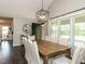 Dining room features a dark wood floor, with views of the front entrance at 235 Stephenson Rd, Benson, NC 27504