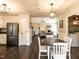 Open floor plan with eat-in kitchen flowing into the living area, perfect for entertaining at 235 Stephenson Rd, Benson, NC 27504
