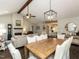 Open living room with high ceilings, wood beams, and dark wood floors at 235 Stephenson Rd, Benson, NC 27504