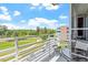 Relaxing outdoor balcony offering lovely views of the golf course at 2410 Environ Way, Chapel Hill, NC 27517
