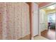 This bathroom showcases a glass-enclosed shower, tile flooring, and a linen closet at 2410 Environ Way, Chapel Hill, NC 27517