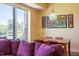 Comfortable dining area features natural light, modern lighting and balcony access at 2410 Environ Way, Chapel Hill, NC 27517