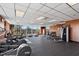 Well-equipped gym with treadmills, weights, and large windows offering beautiful outdoor views at 2410 Environ Way, Chapel Hill, NC 27517