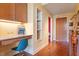 This home office features a granite desktop and built in cabinets and shelving at 2410 Environ Way, Chapel Hill, NC 27517