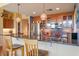 This gourmet kitchen features granite counters and stainless steel appliances at 2410 Environ Way, Chapel Hill, NC 27517