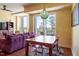 This living room features hardwood floors and big windows with beautiful views at 2410 Environ Way, Chapel Hill, NC 27517