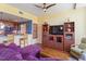 Open concept living and dining area with breakfast bar, hardwood floors and view at 2410 Environ Way, Chapel Hill, NC 27517