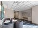 Comfortable lobby with stylish seating, unique wall art, and hallway views, creating a welcoming atmosphere at 2410 Environ Way, Chapel Hill, NC 27517